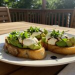 Final dish of Avocado-Burrata-Bruschetta, showcasing creamy and fresh summer flavors.